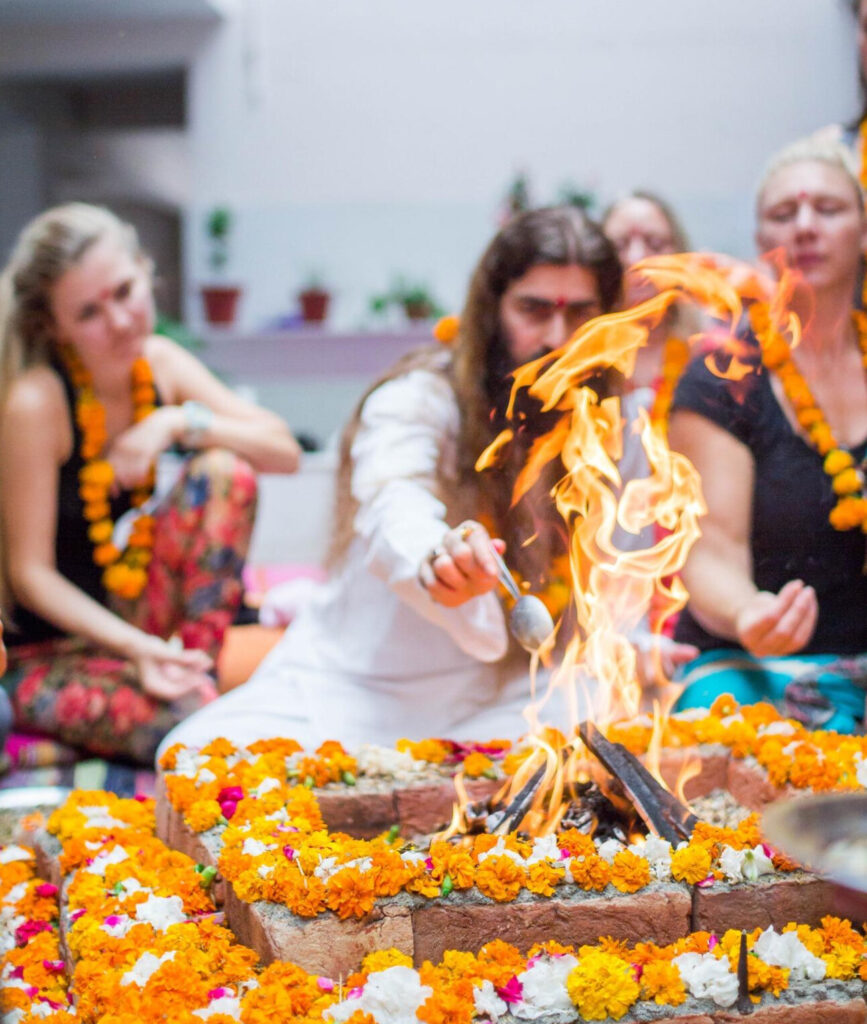 Yogi Chandrakant doing a Yajna at Hummingbee Yoga School in Rishikesh